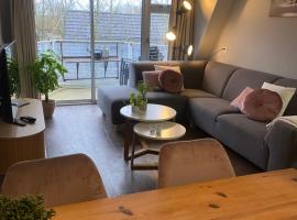 Heerlijk appartement op Texel vlakbij bos en zee.，位于德科赫的酒店