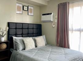 Bamboo Bay Community condominium，位于曼达维市的酒店