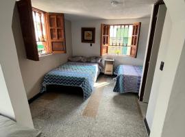 El refugio del zipa habitación 102，位于锡帕基拉的酒店