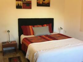 Apartamento con jardín cerca del hospital regional，位于卡库佩的酒店