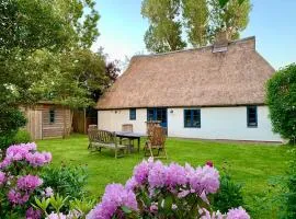 Reetdachkate Müllerhaus von 1860