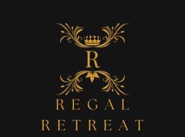 Regal Retreat，位于迪布鲁加尔的酒店