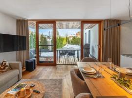 Modern garden apartment with sauna near ski lift，位于Feuring的酒店