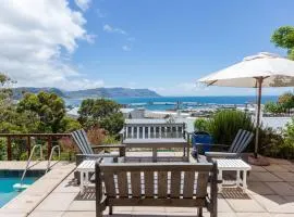 SEIA Dream offers stunning ocean views, sunny living spaces, plunge pool and terraces perfect for relaxing, Walk to Simons Town, Seaforth Beach, Boulders Beach penguins, high speed internet, smart TV and back up solar, ideal for families or remote work