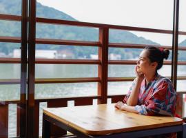River Side Maruyama，位于丰冈市的酒店