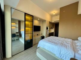 Serene Studio at Casa De Parco Apartment，位于萨姆波罗的酒店