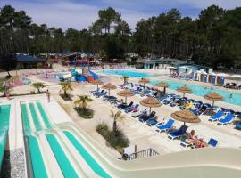 Mobilhome Mag Ced les Dunes de contis Piscines et Plage，位于波讷地区圣朱利安的酒店