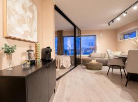 Uranus apartment - view over Tromsøya，位于Tomasjorda的酒店
