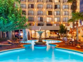 华雷斯城卢鲁斯那酒店，位于华雷斯城的酒店