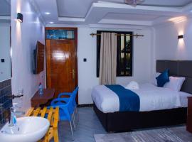 The Grand Brystal Comfort Inn，位于Mbweka的酒店