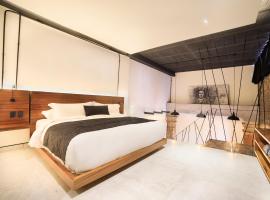 Hotel Tila，位于乔卢拉的酒店