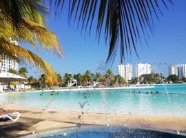 Centrally Located Apartment in Town Center，位于里奥阿托的海滩酒店