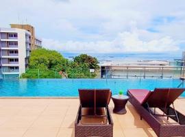 Srirachaseabreeze hotel，位于是拉差的酒店