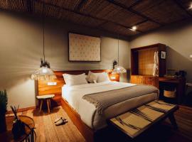 Sambora Kinigi，位于Kinigi的带停车场的酒店