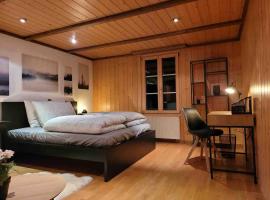 Mountain View Apartment in Leissigen by Interlaken，位于莱西根的酒店