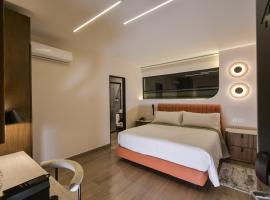 Expo Satelite 2750 Hotel & Suites，位于瓜达拉哈拉的自助式住宿