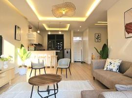 Modern Lakeside Condo Pearl Marina Estate Garuga，位于Ntabwe的酒店