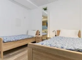 Private room #5 with 2 beds, ground floor, AC, only 2min to RAB