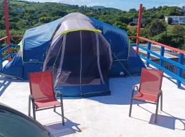 Rooster Run Glamping Camping has rooftop and off the ground Glamping experience for 1 to 16 in a single tent and views of The Rain Forrest and to Culebra across the Atlantic Ocean w Tents, Linens, Deluxe Air Beds, Warm Shower and More at a Great Price