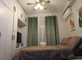 simple condo free WiFi free pool，位于Agus的酒店