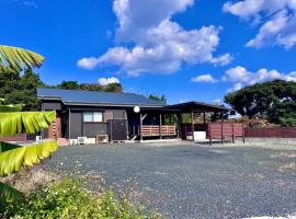 AZホテル Inn 奄美万屋 - Villa with private outdoor Jacuzzi，位于奄美的酒店