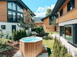 ZSAM Chalets mit Sauna und Hottub，位于加尔米施-帕滕基兴的木屋