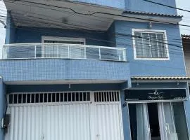 Casa azul alto padrão