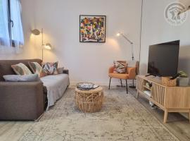 Maison cosy avec jardin, clim, WiFi, animaux OK, parking gratuit à Enghien - FR-1-649-118，位于昂吉安班斯的酒店