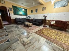 Wan Homestay Kulim Hi-Tech utk Msliim shj，位于居林的酒店