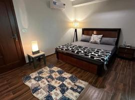 1BHK Cozy Condo with City View，位于伊斯兰堡的酒店
