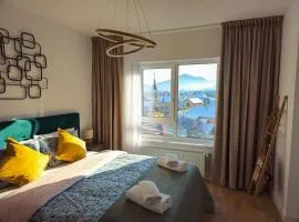 Mountain and City View with Underground Parking