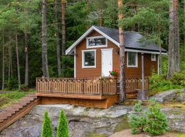 Vakantiehuis met sauna en hot tub，位于Koppom的酒店
