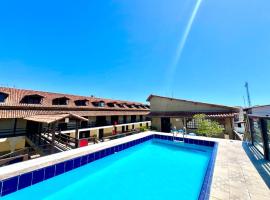 Lindo duplex 2quad praia com piscina，位于Peró的酒店