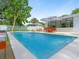 Charming 4BR Oasis with Saltwater Pool and Parking