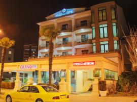 格兰德酒店，位于爱尔巴桑的酒店