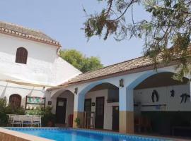 Alojamiento El Cortijuelo，位于Escóznar的酒店