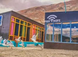 snow land wooden cottage