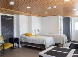 Huoneisto viehättävällä puutaloalueella