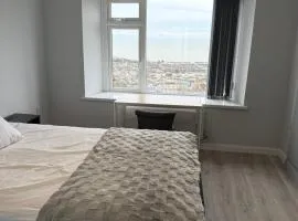 Elegant room with sea and garden view in Swansea city centre