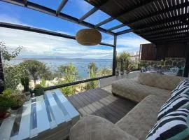 Preciosa casa frente al mar