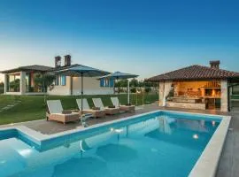 Villa Evelyn in Fažana with 50 m2 pool, jacuzzi, kids playground & sea view only 800 meters from beach