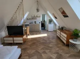 Dachgeschosswohnung 2 - Apartments am Schloss