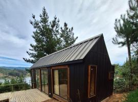 Acuarela minicasas con piscina en Lago Vichuquen，位于维丘肯的酒店