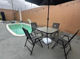 Casa Piscina Ilha Comprida，位于伊利亚孔普里达的酒店