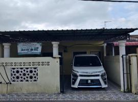 Qs Family Homestay Pasir Tumboh，位于古邦阁亮的酒店