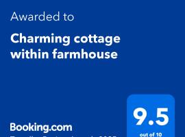 Charming cottage within farmhouse，位于蒙默思的酒店