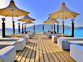 Oscar Seaside & Spa Hotel by Club Aquarium，位于Guvercinlik的海滩酒店