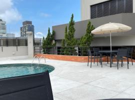 Flat em Hotel com Estacionamento Grátis e Piscina，位于桑托斯的酒店