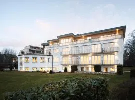 Hotel Vier Jahreszeiten an der Therme & Kliniken Bad Krozingen Nähe Freiburg & Schwarzwald Ideal für Wellness Kur & Business Ausflüge 24h Check In- WLAN & Parken gratis