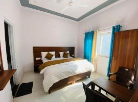 Ved Tree Inn by Yatrimap，位于瑞诗凯诗Dehradun Airport - DED附近的酒店